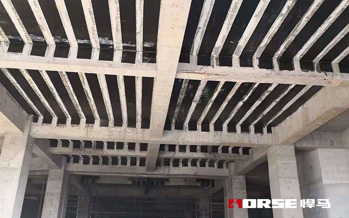 Externally Bonded FRP Systems for Structural Repair and Strengthening